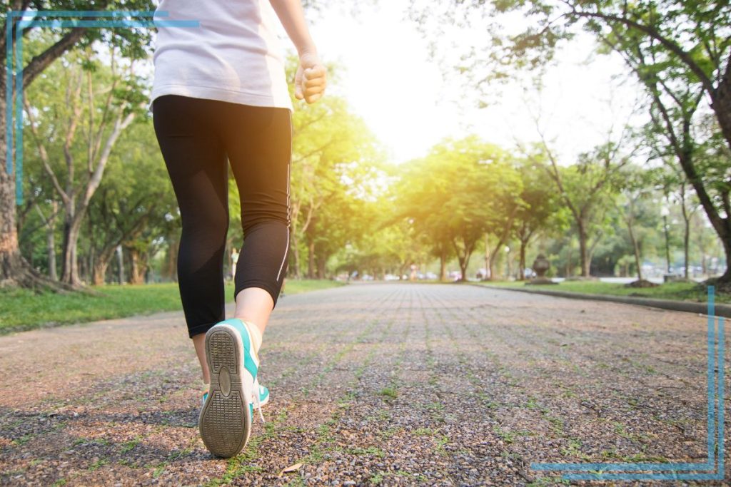 Woman running on a road.